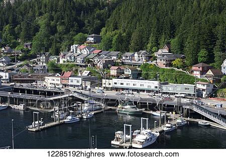Stock Photograph - Waterfront buildings and fishing boats, Ketchikan, Southeast Alaska, summer. Fotosearch