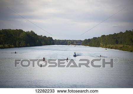 Welland Regatta, racing shells on the water; Peterborough, Ontario, Canada View Large Photo Image Stock Image - Welland Regatta, racing shells on the water; Peterborough, Ontario, Canada. Fotosearch