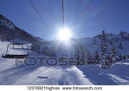 Stock Photograph - Whistler Blackcomb Glacier Express chairlift; Whistler, British Columbia, Canada. Fotosearch