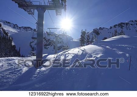 Stock Photograph - Whistler Blackcomb Glacier Express chairlift; Whistler, British Columbia, Canada. Fotosearch