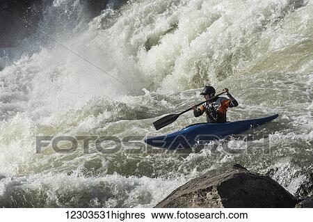 Stock Photograph - Whitewater kayaking in rapids of the Potomac River, Great Falls Park; Maryland, United States of America. Fotosearch