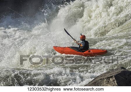 Stock Photograph - Whitewater kayaking in rapids of the Potomac River, Great Falls Park; Maryland, United States of America. Fotosearch