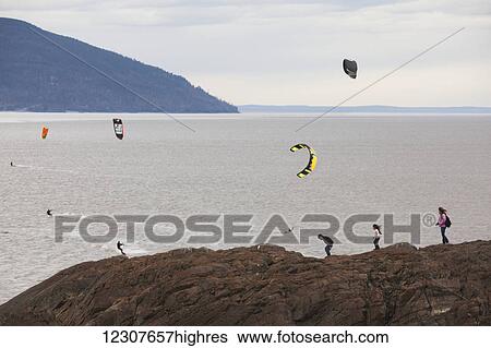 Wind surfers play on Turnagain Arm, Southcentral Alaska, USA View Large Photo Image Stock Photograph - Wind surfers play on Turnagain Arm, Southcentral Alaska, USA. Fotosearch