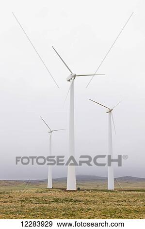 Wind turbines on green tundra, St. Paul Island, Southwestern Alaska, USA, Summer View Large Photo Image Stock Photo - Wind turbines on green tundra, St. Paul Island, Southwestern Alaska, USA, Summer. Fotosearch