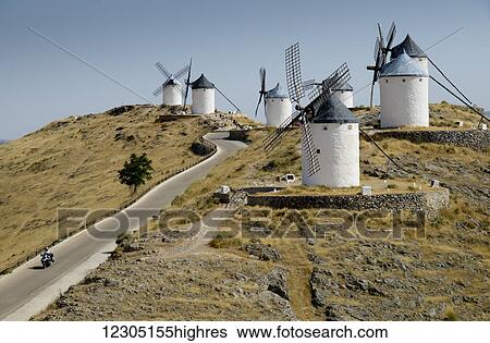 Windmills on a hilltop; Consuegra, Castile-La Mancha, Spain View Large Photo Image Stock Photograph - Windmills on a hilltop; Consuegra, Castile-La Mancha, Spain. Fotosearch