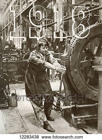 Stock Photo - Women take over on the home front in 1918. From The Story of 25 Eventful Years in Pictures published 1935. Fotosearch