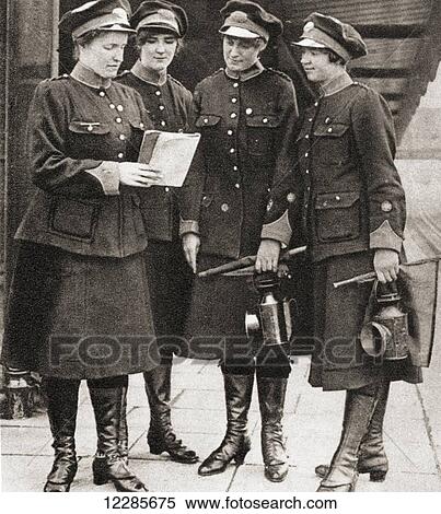 Stock Photography - Women working as porters, guards and inspectors on the London underground railway during World War One, thereby leaving the men free to fight. From The Pageant of the Century, published 1934. Fotosearch