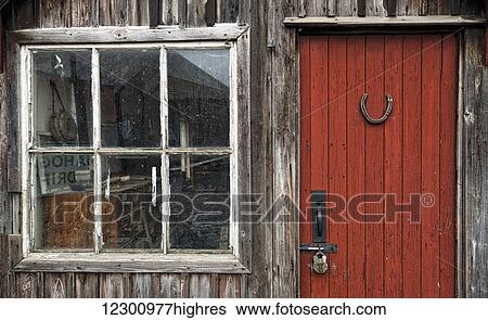 Wooden building with red painted door, padlock and window; Beamish, Durham, England View Large Photo Image Stock Photograph - Wooden building with red painted door, padlock and window; Beamish, Durham, England. Fotosearch