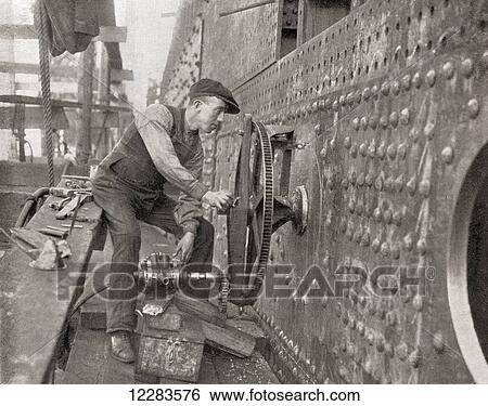 Worker using a pneumatic tool for cutting out sidelights. From The Romance of the Merchant Ship, published 1931. View Large Photo Image Stock Photograph - Worker using a pneumatic tool for cutting out sidelights. From The Romance of the Merchant Ship, published 1931.. Fotosearch