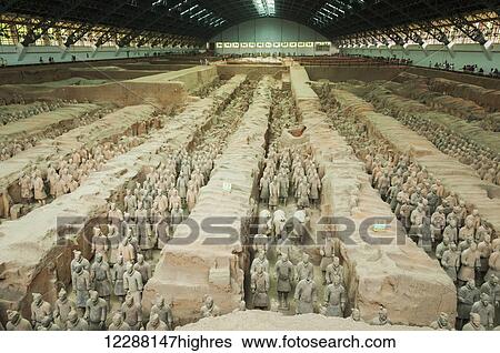 Stock Photograph - Xians Terracota Warriors, a collection of terracotta sculptures depicting the armies of Qin Shi Huang, the first Emperor of China. It is a form of funerary art buried with the emperor in 210209 BCE and whose purpose was to protect the emperor in his.... Fotosearch