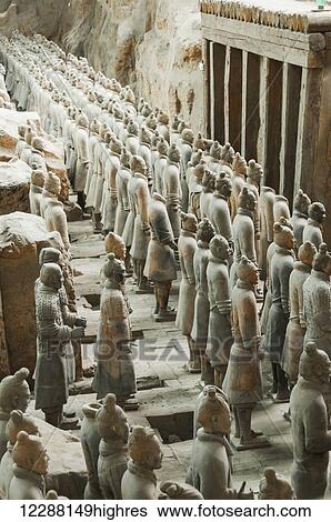 Stock Photograph - Xians Terracota Warriors, a collection of terracotta sculptures depicting the armies of Qin Shi Huang, the first Emperor of China. It is a form of funerary art buried with the emperor in 210209 BCE and whose purpose was to protect the emperor in his.... Fotosearch