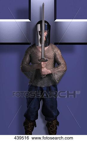 Stock Photograph - Christian dressed in the armor of God (blue). Fotosearch