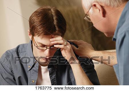 Help for a young man View Large Photo Image Stock Photography - Help for a young man. Fotosearch