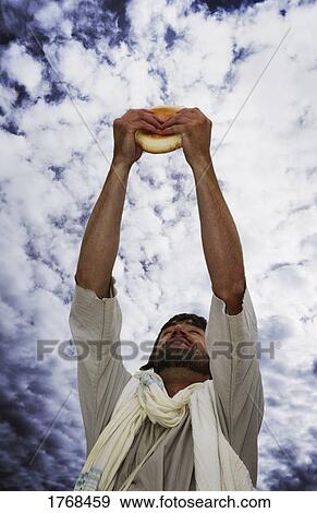 Stock Photo - Jesus blesses bread. Fotosearch