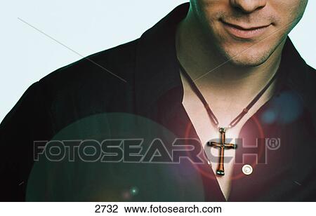 Stock Image - man wearing cross. Fotosearch