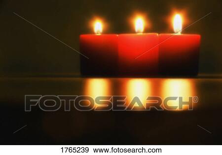 Three candles View Large Photo Image Stock Photo - Three candles. Fotosearch