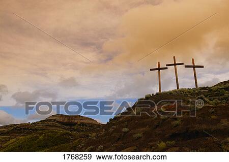 Three crosses on a hill View Large Photo Image Stock Photo - Three crosses on a hill. Fotosearch