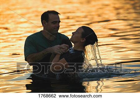 Stock Image - A baptism. Fotosearch