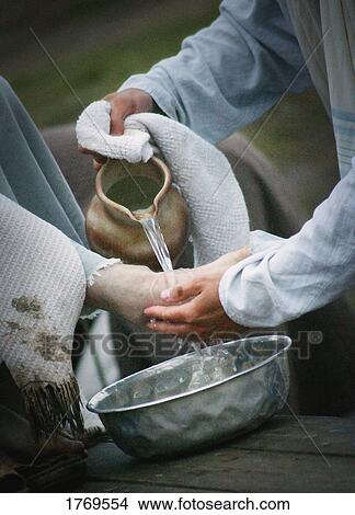 Jesus washes disciple's feet View Large Photo Image Picture - Jesus washes disciple's feet. Fotosearch