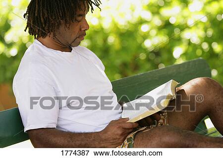 Man reading bible View Large Photo Image Stock Photo - Man reading bible. Fotosearch
