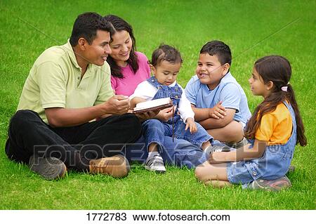 Parents with three young children View Large Photo Image Stock Image - Parents with three young children. Fotosearch