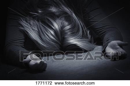 Stock Image - Woman praying. Fotosearch