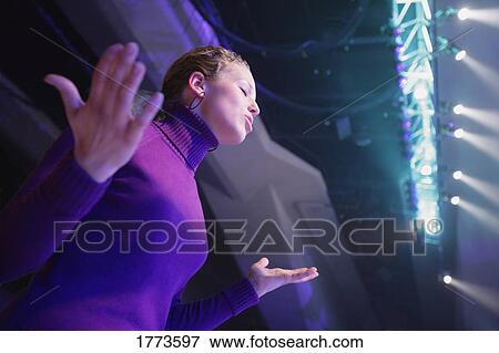 Stock Photo - Woman worshiping. Fotosearch