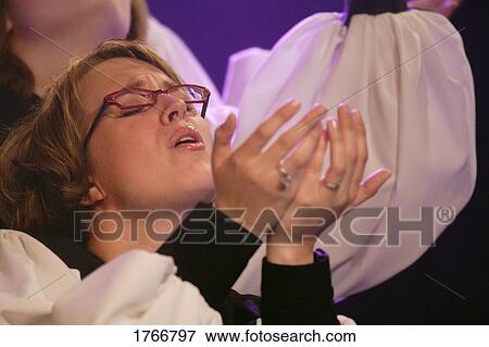 Worshipping in a choir View Large Photo Image Stock Photo - Worshipping in a choir. Fotosearch