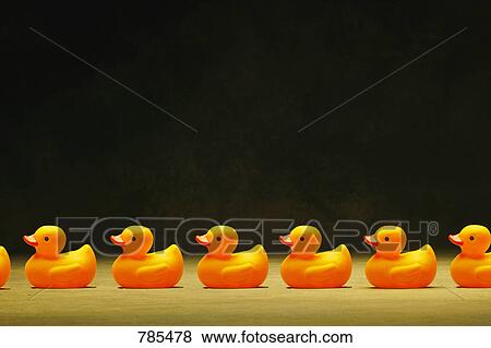 Stock Photo - Ducks in a row. Fotosearch