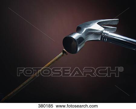 Hammer hitting the nail View Large Photo Image Stock Photography - Hammer hitting the nail. Fotosearch