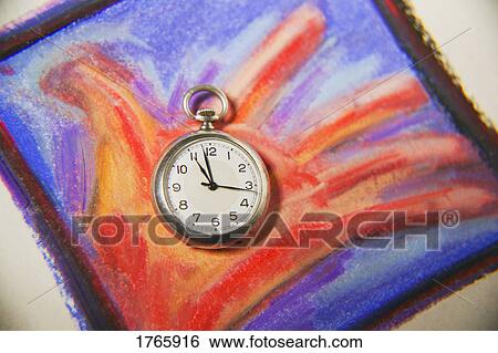 Holding onto time View Large Photo Image Stock Photograph - Holding onto time. Fotosearch