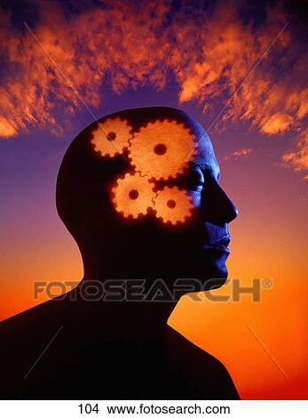 Picture - Surreal silhouette of man thinking. Fotosearch