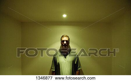 Under a bright light View Large Photo Image Stock Photo - Under a bright light. Fotosearch
