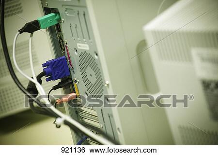 Stock Photograph - Behind the computer. Fotosearch