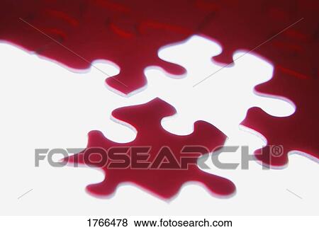 Completing a puzzle View Large Photo Image Stock Photo - Completing a puzzle. Fotosearch