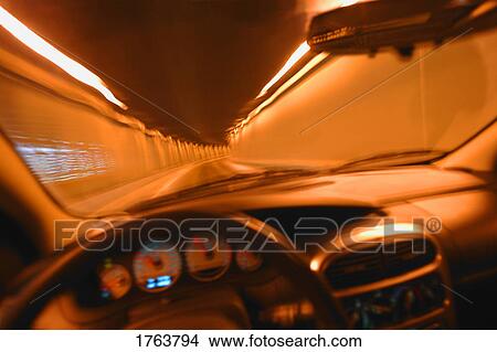 Driving through a tunnel View Large Photo Image Picture - Driving through a tunnel. Fotosearch
