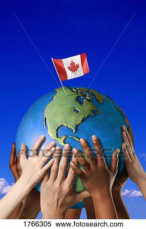 Stock Photography - Hands on a globe. Fotosearch