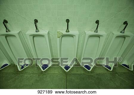 Stock Photo - Row of urinals. Fotosearch
