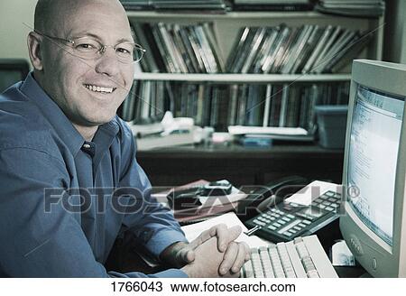 Businessman with computer View Large Photo Image Stock Image - Businessman with computer. Fotosearch