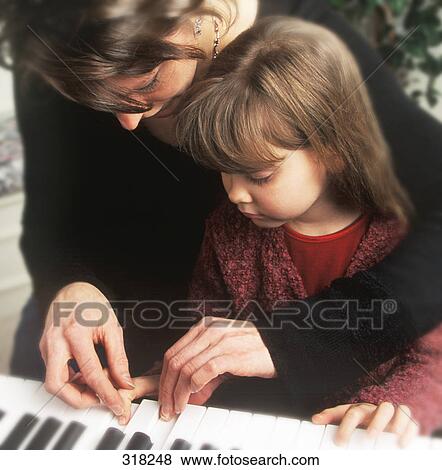 Piano lessons View Large Photo Image Stock Photo - Piano lessons. Fotosearch