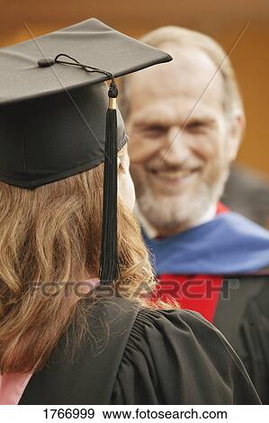 Stock Photo - Receiving the diploma. Fotosearch