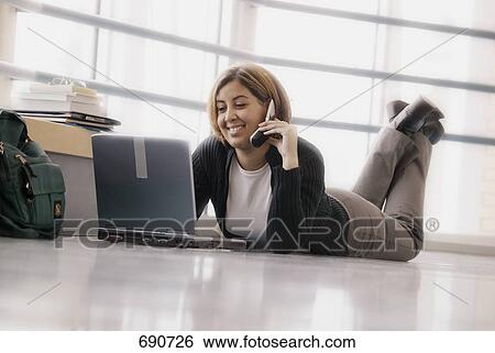 Student does homework in school View Large Photo Image Stock Photograph - Student does homework in school. Fotosearch