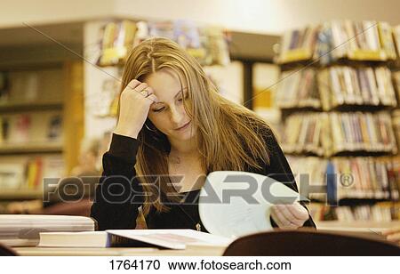 Student in library View Large Photo Image Stock Image - Student in library. Fotosearch