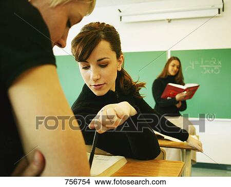Picture - Students in classroom. Fotosearch