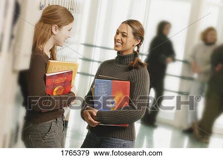 Stock Photo - Students in the hallway. Fotosearch