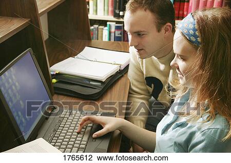 Students on a computer View Large Photo Image Stock Image - Students on a computer. Fotosearch