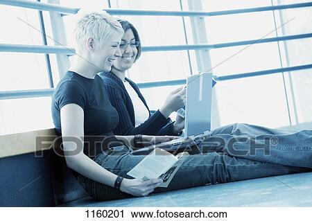 Stock Image - Students with lap top computer. Fotosearch