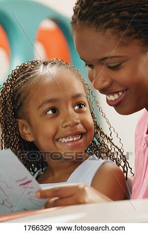 Teacher and child View Large Photo Image Stock Photo - Teacher and child. Fotosearch