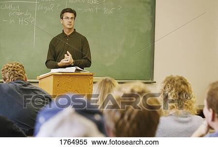 Teacher in a classroom View Large Photo Image Stock Photography - Teacher in a classroom. Fotosearch