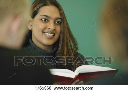 Teacher teaches class View Large Photo Image Stock Photo - Teacher teaches class. Fotosearch